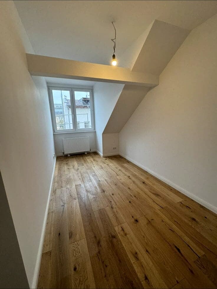 Ausgebautes Dachgeschoss mit Eichendielen – Referenzprojekt